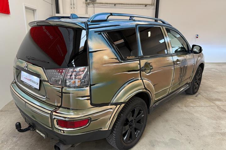 Brun Mitsubishi Outlander fra 2010