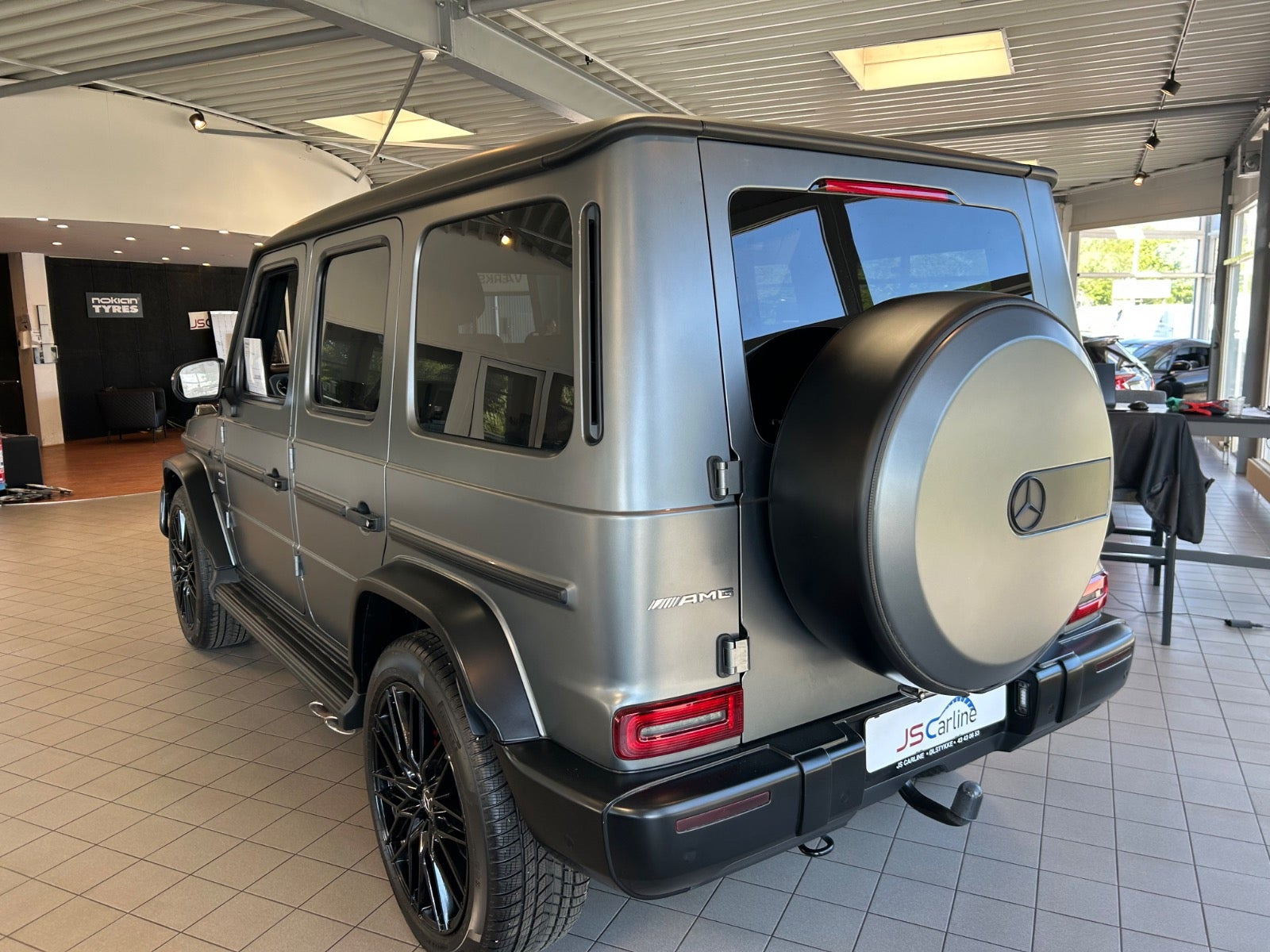 Grå Mercedes G63 fra 2020