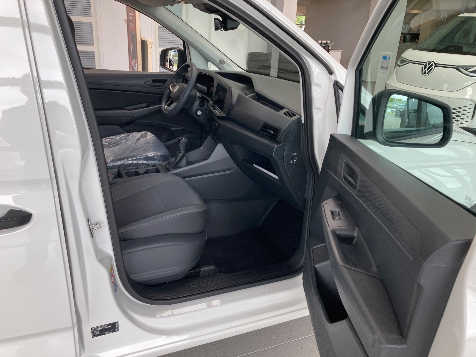Hvid VW Caddy fra 2026