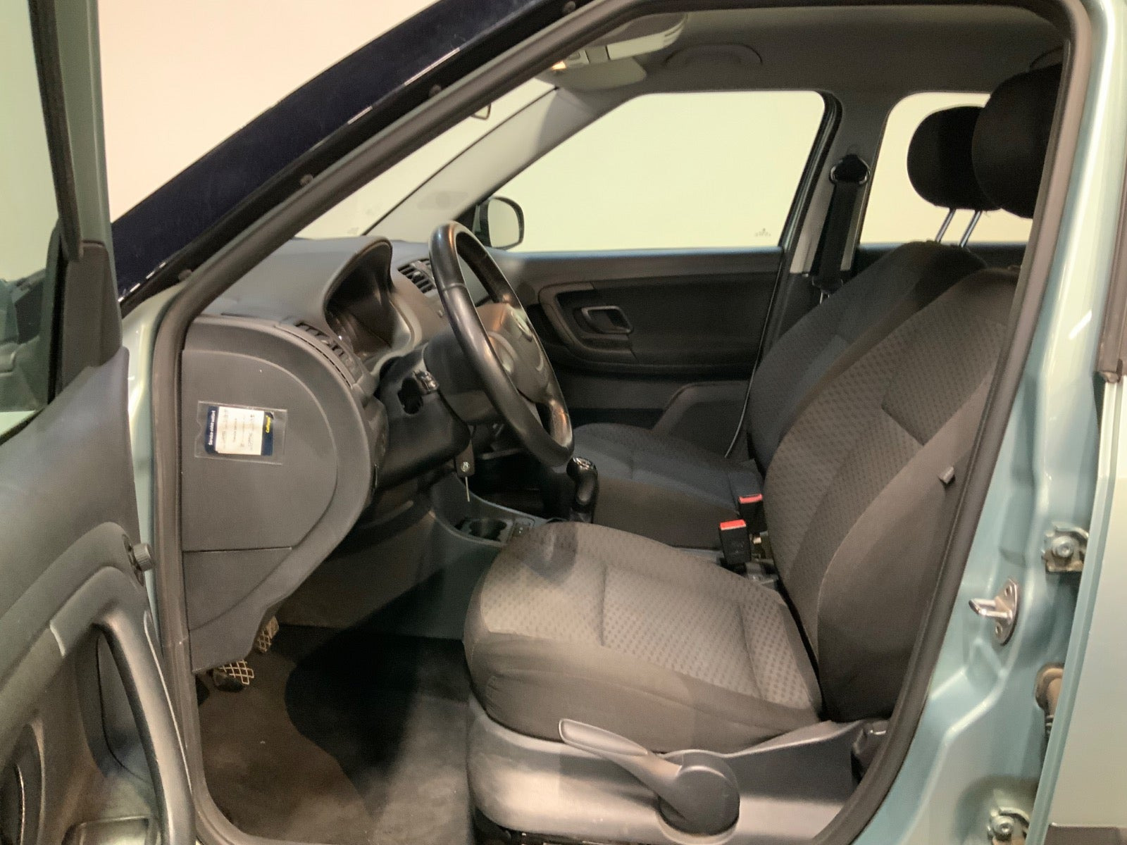 Grøn Skoda Fabia fra 2013
