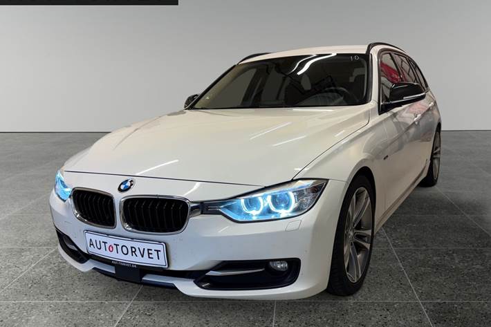 Hvid BMW 328i fra 2013