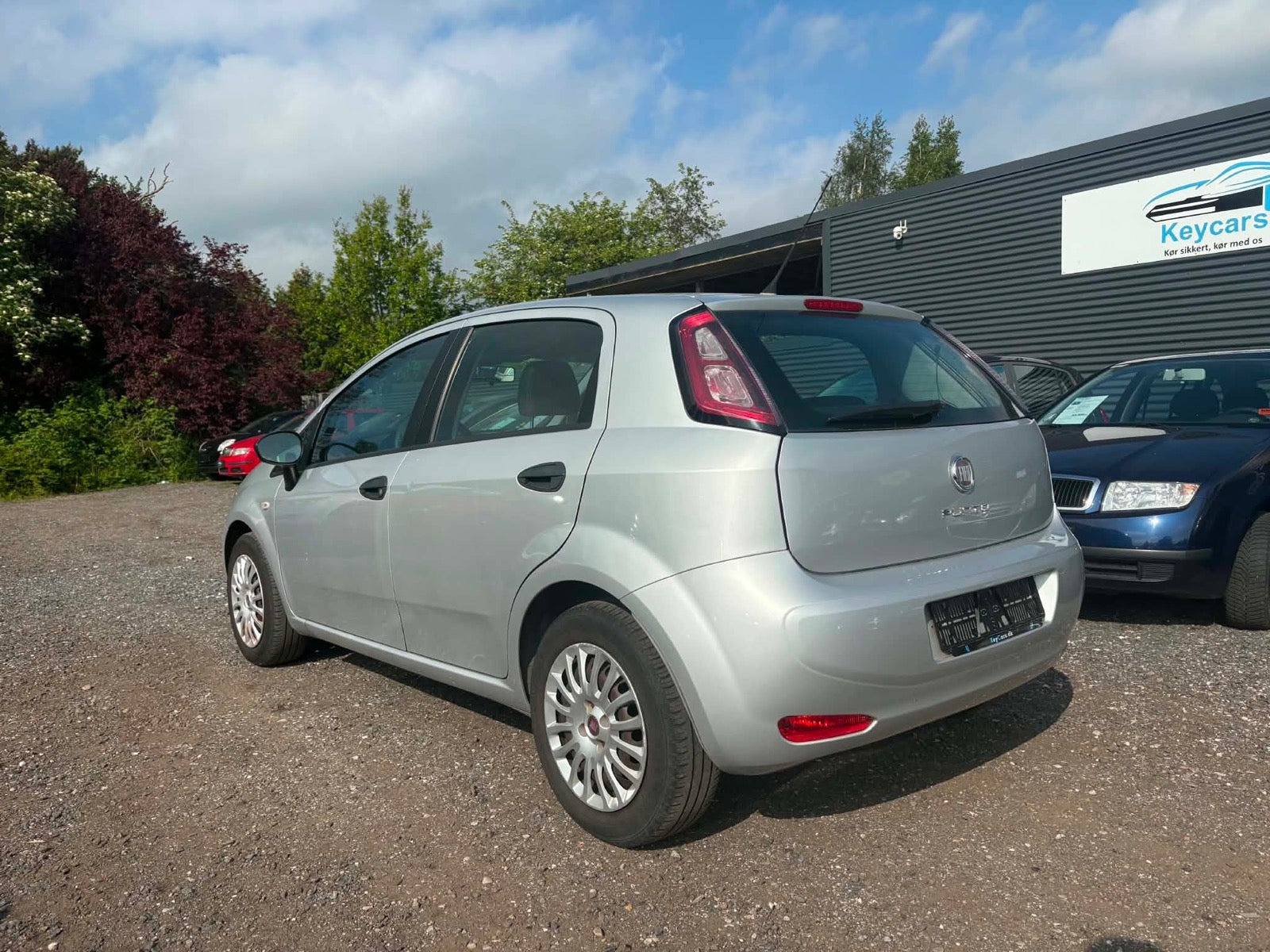 Grå Fiat Punto fra 2012