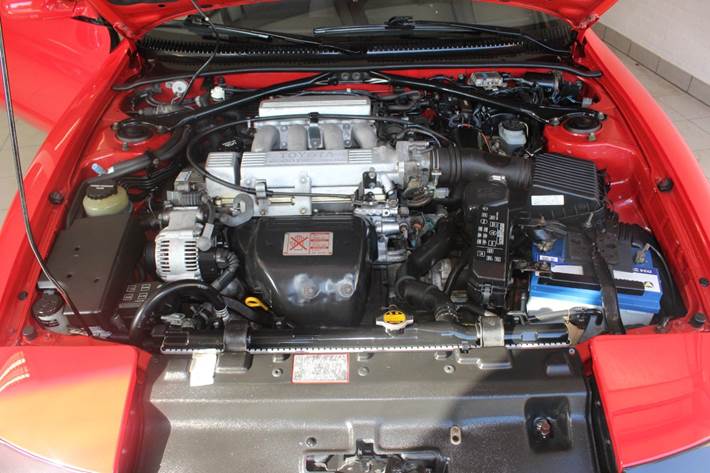Rød Toyota Celica fra 1991