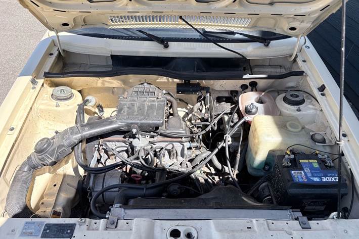 Beige VW Caddy fra 1989