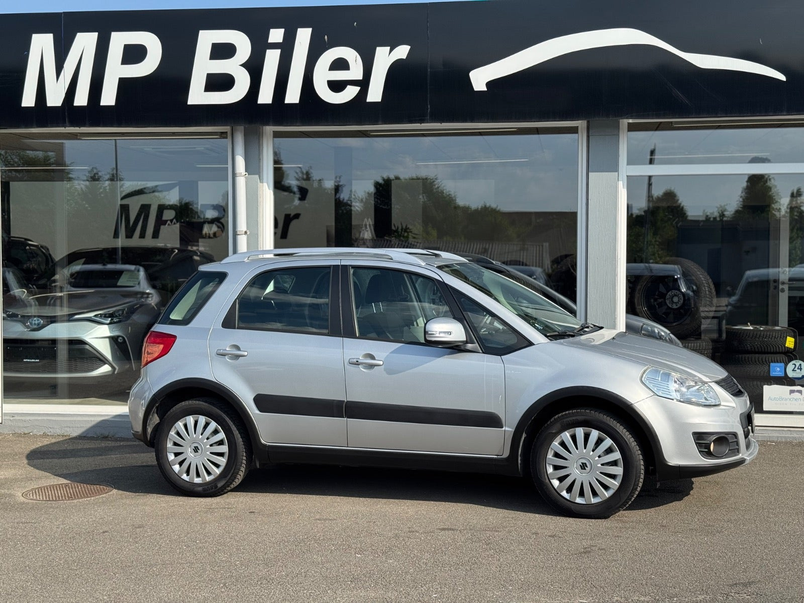 Sølv Suzuki SX4 fra 2014