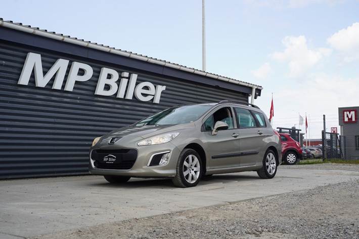 Beige Peugeot 308 fra 2012
