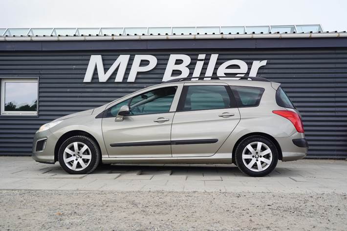 Beige Peugeot 308 fra 2012
