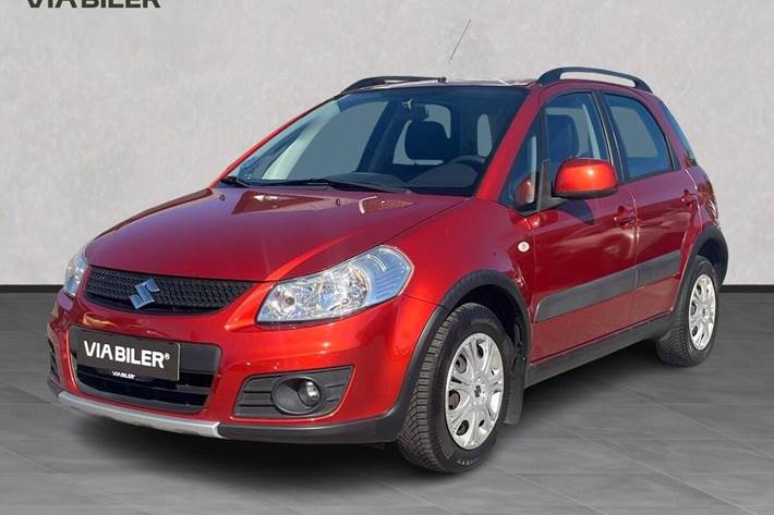 Orange Suzuki SX4 fra 2010