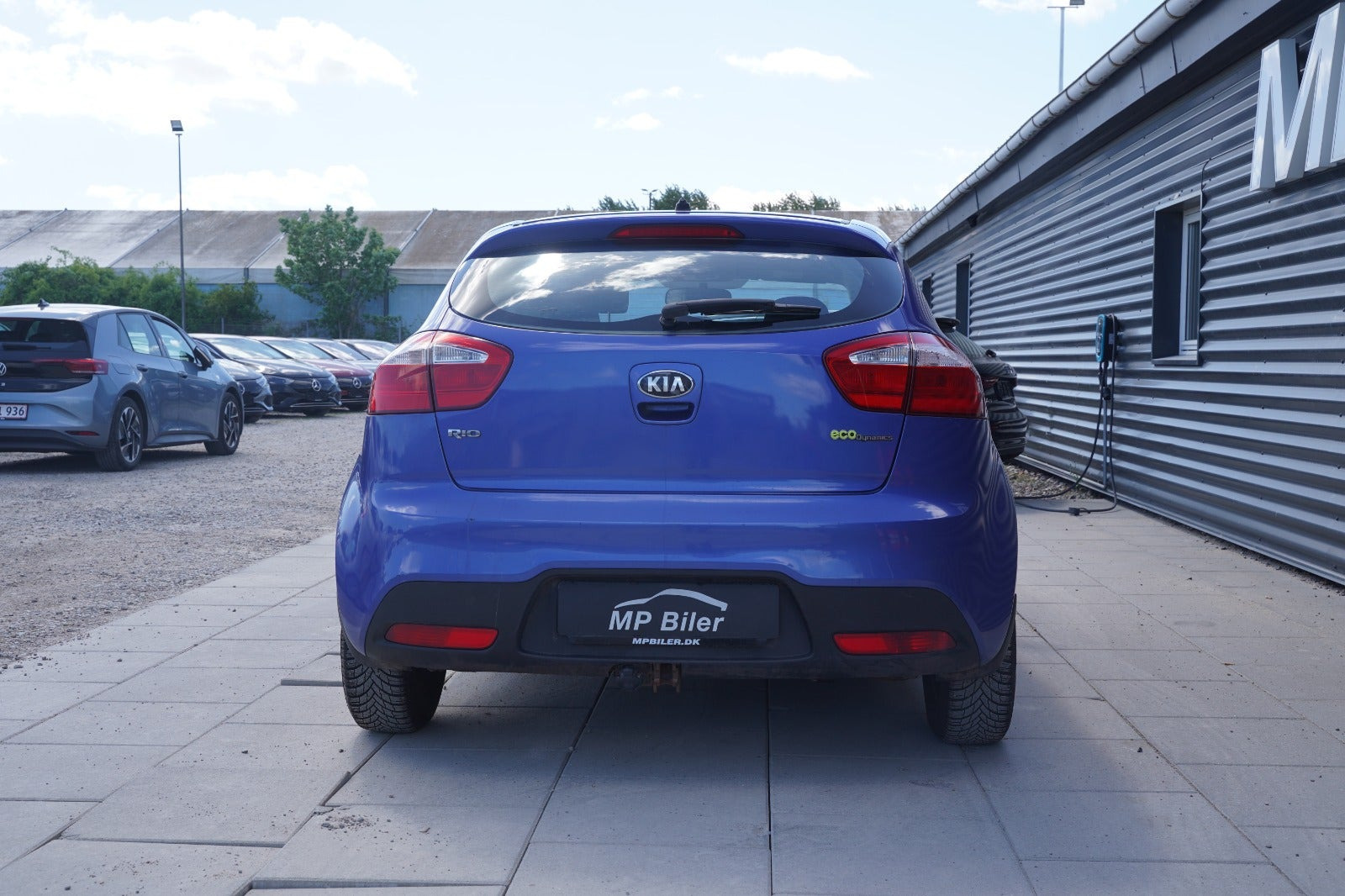 Blå Kia Rio fra 2013