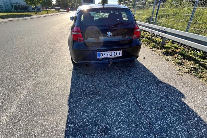 Sort BMW 116d fra 2011 set udefra