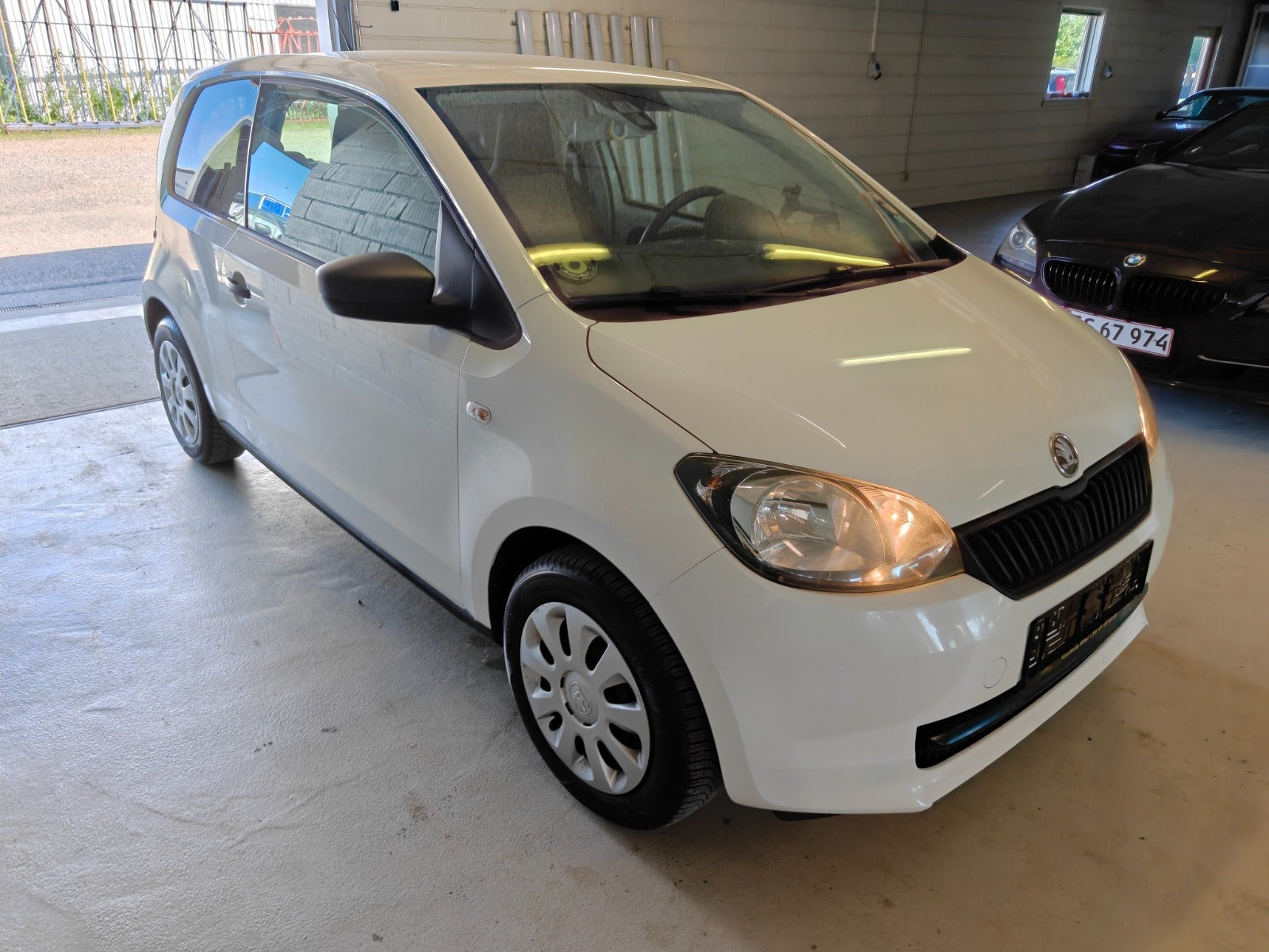 Gul Skoda Citigo fra 2012