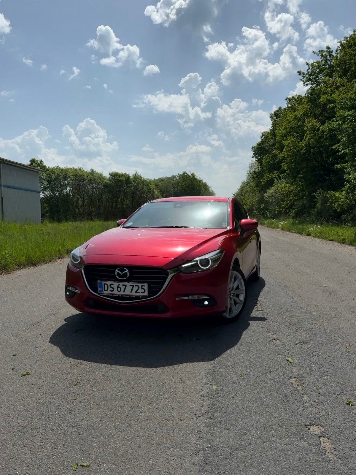 Rød Mazda 3 fra 2017