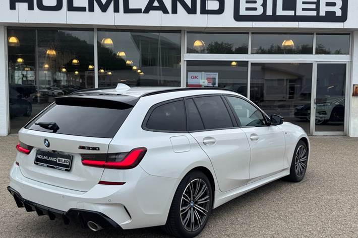 Hvid BMW 330e fra 2021