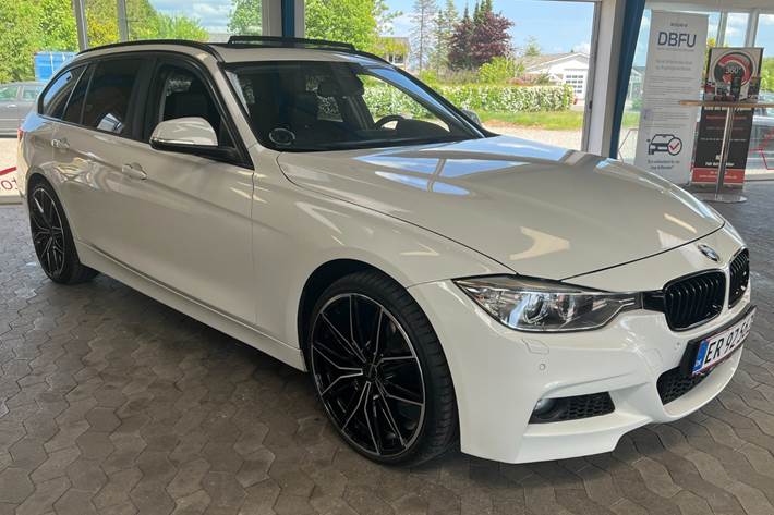Hvid BMW 320d fra 2014 set udefra