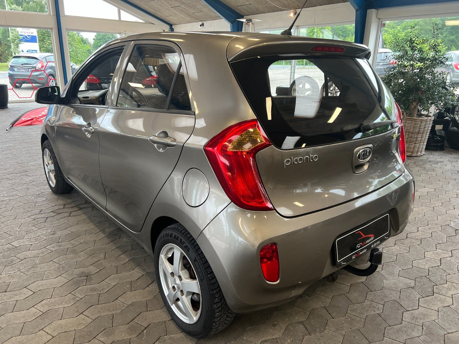 Beige Kia Picanto fra 2011