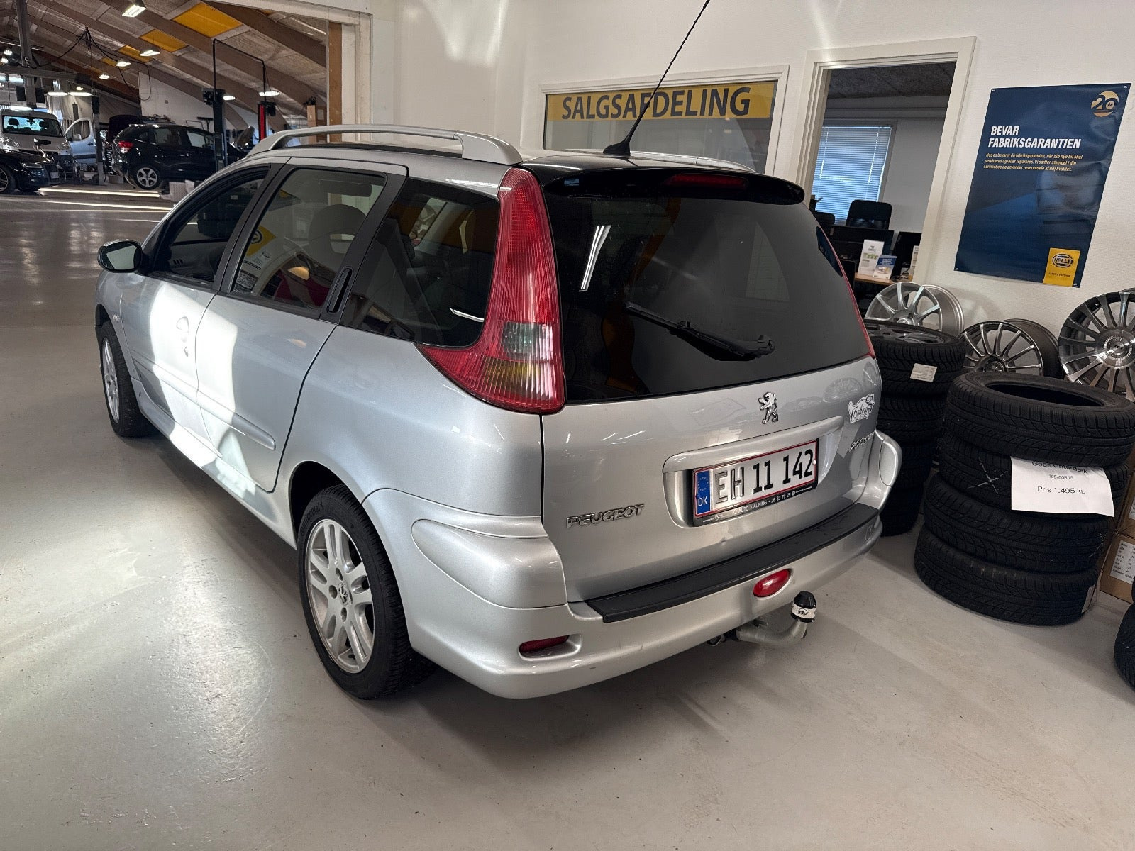 Sølv Peugeot 206 fra 2006