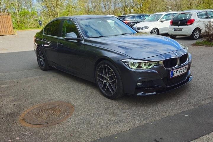 Grå BMW 320d fra 2018