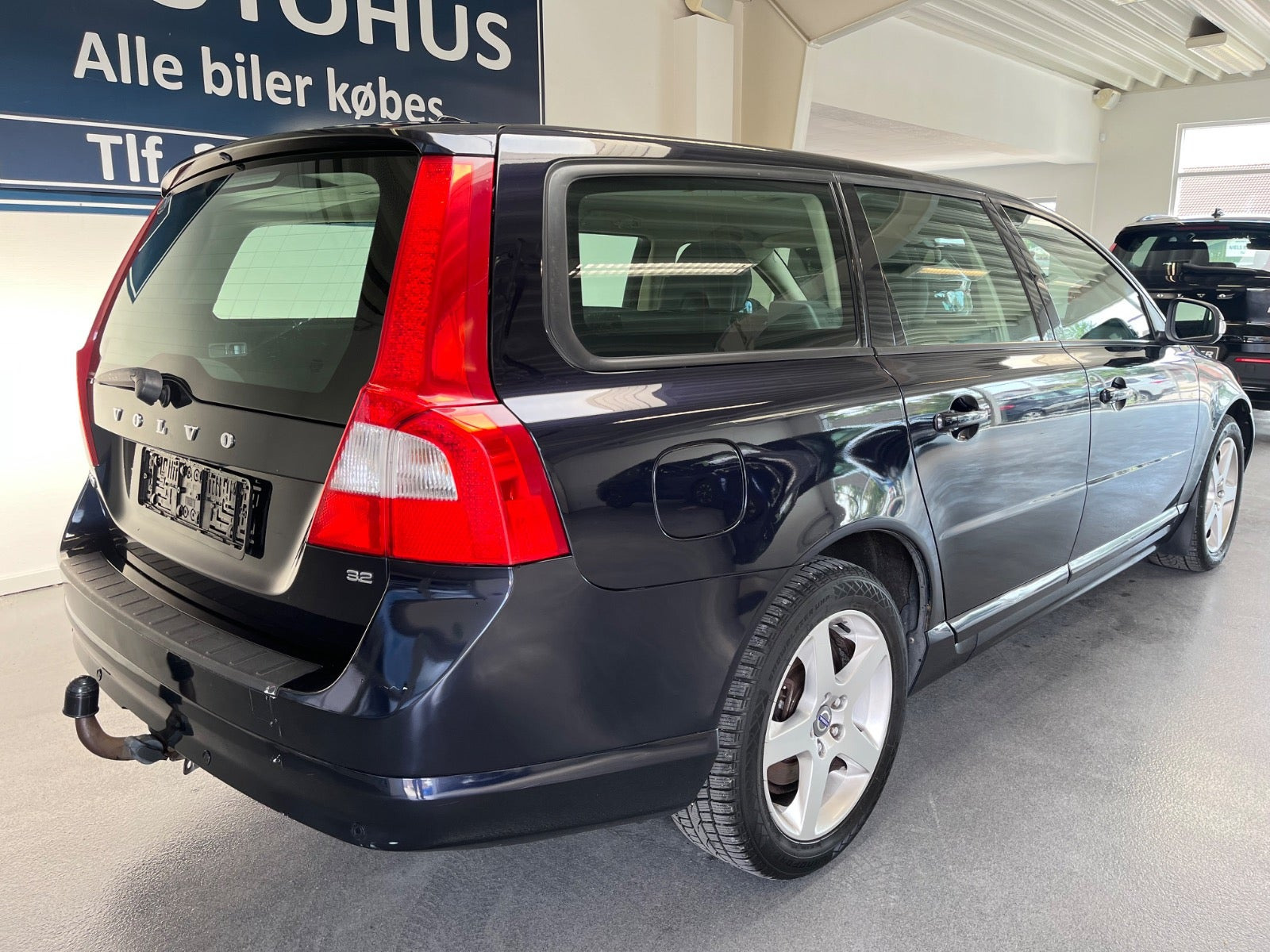 Grøn Volvo V70 fra 2008