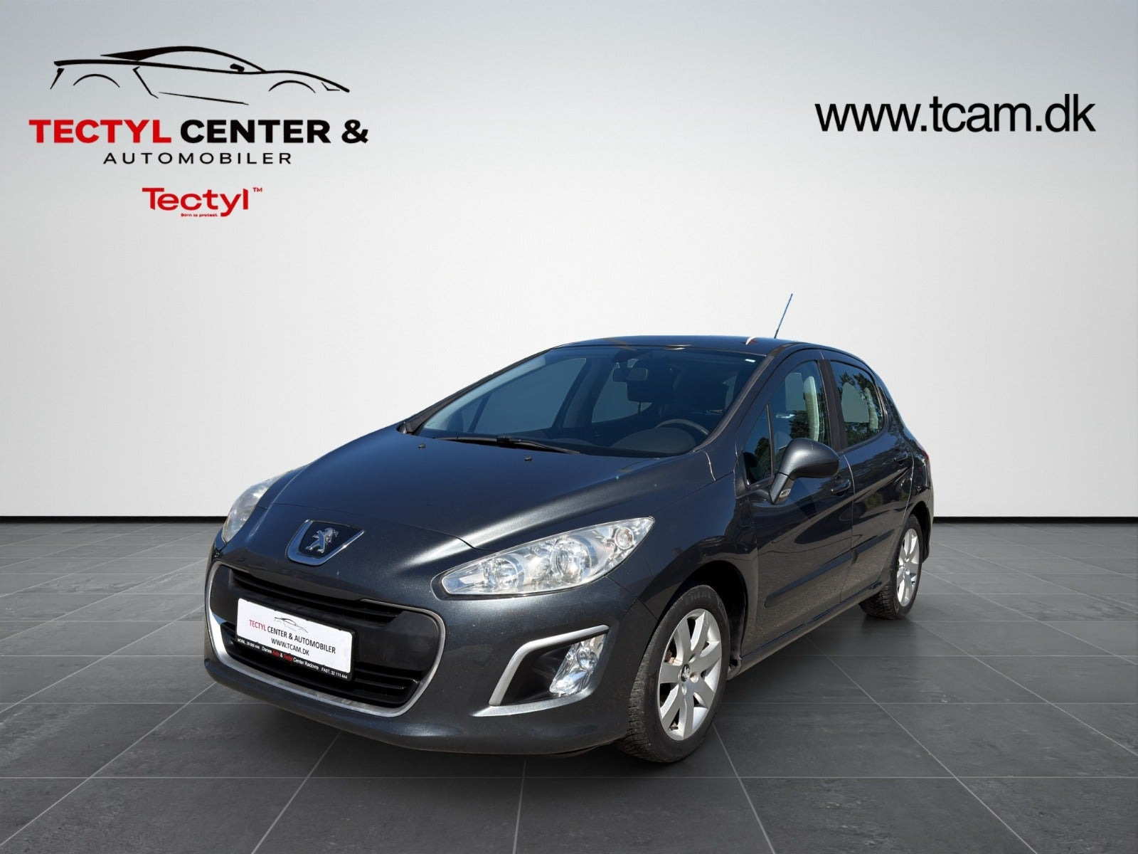 Grå Peugeot 308 fra 2013