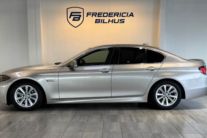 Beige BMW 520d fra 2012