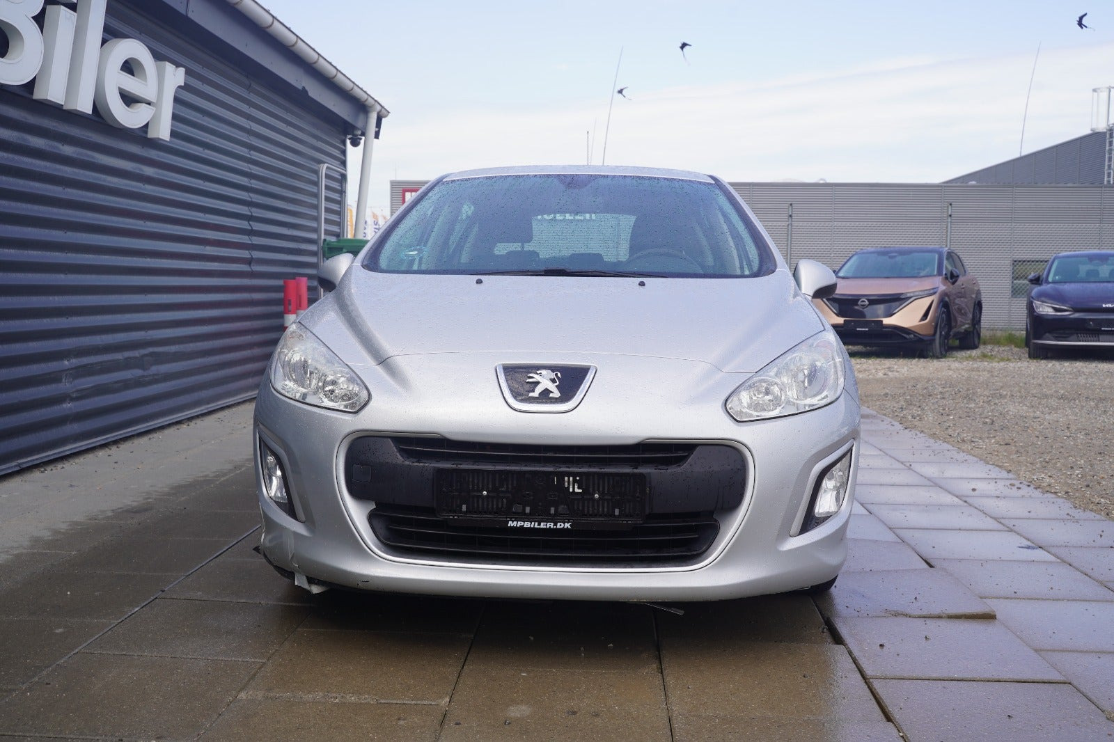 Sølv Peugeot 308 fra 2012