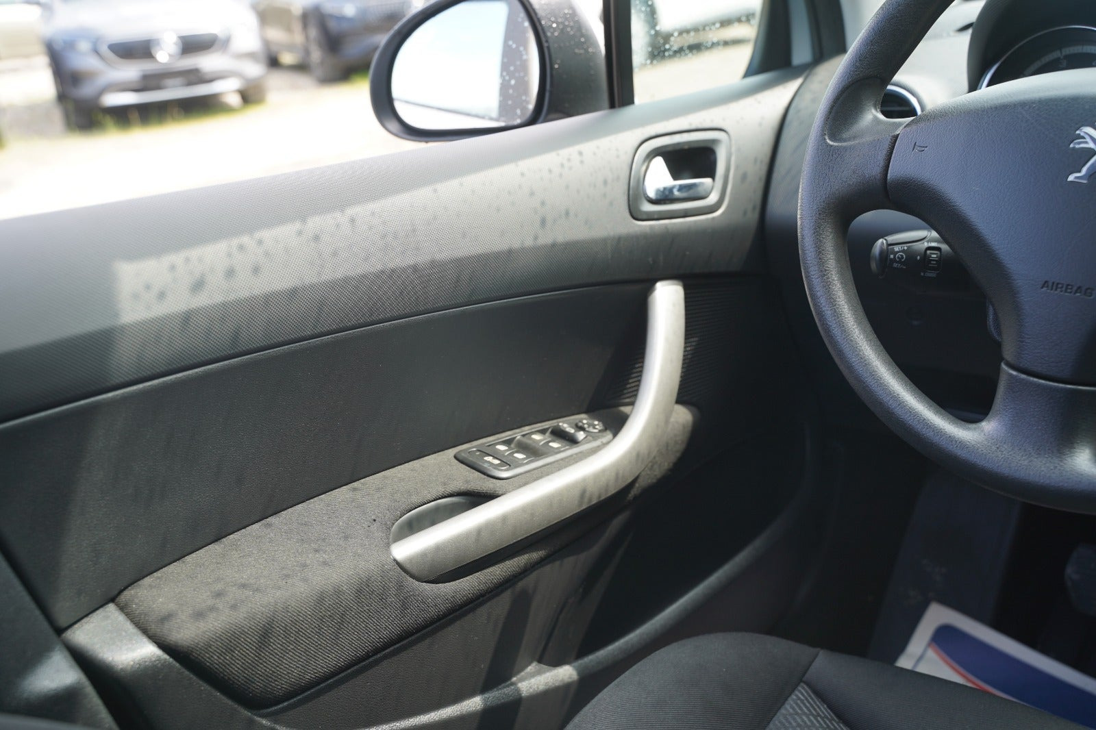 Sølv Peugeot 308 fra 2012