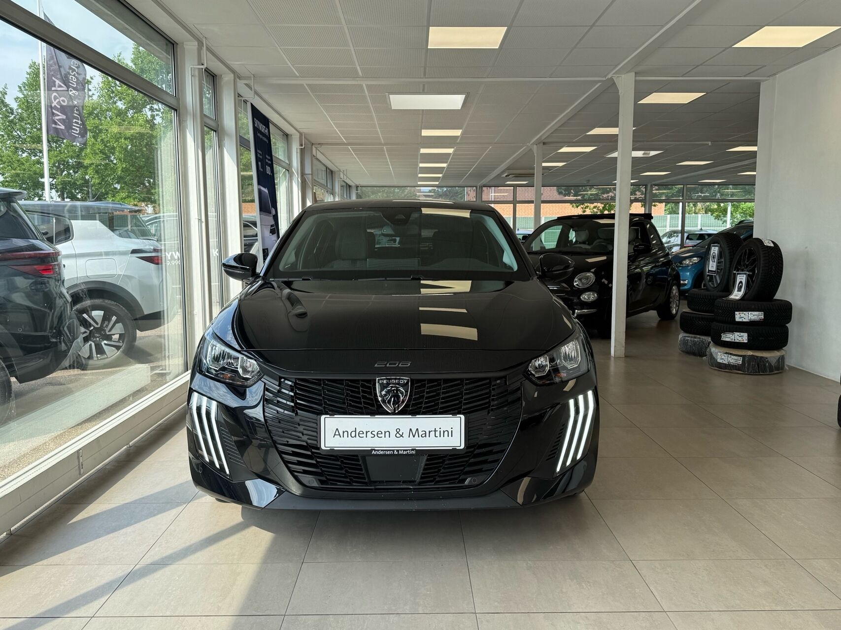 Sort Peugeot e-208 fra 2025