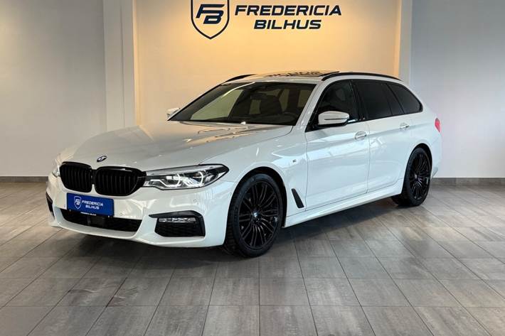 Beige BMW 520d fra 2017