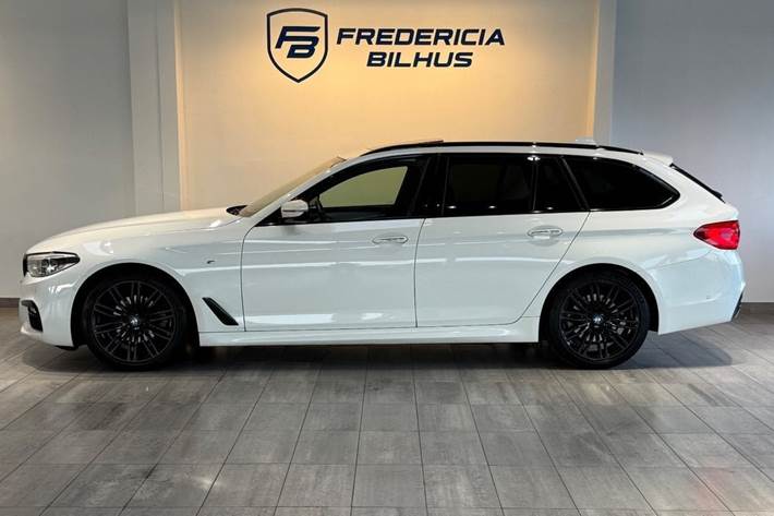 Beige BMW 520d fra 2017