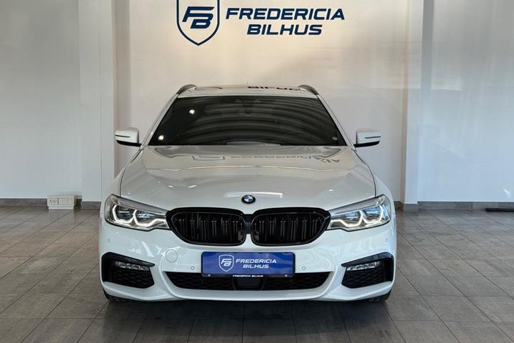 Beige BMW 520d fra 2017