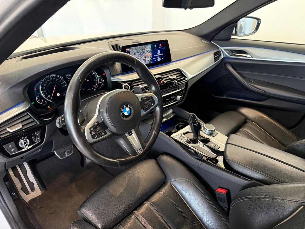 Beige BMW 520d fra 2017