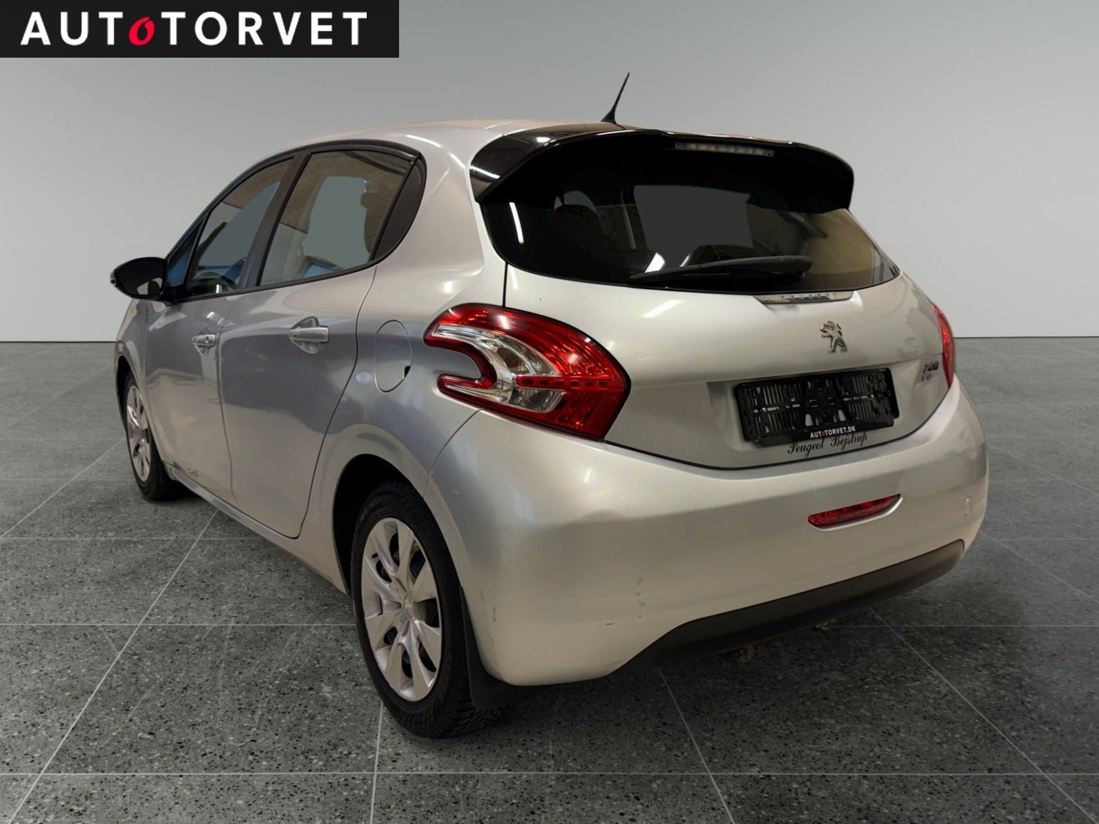 Sølv Peugeot 208 fra 2012