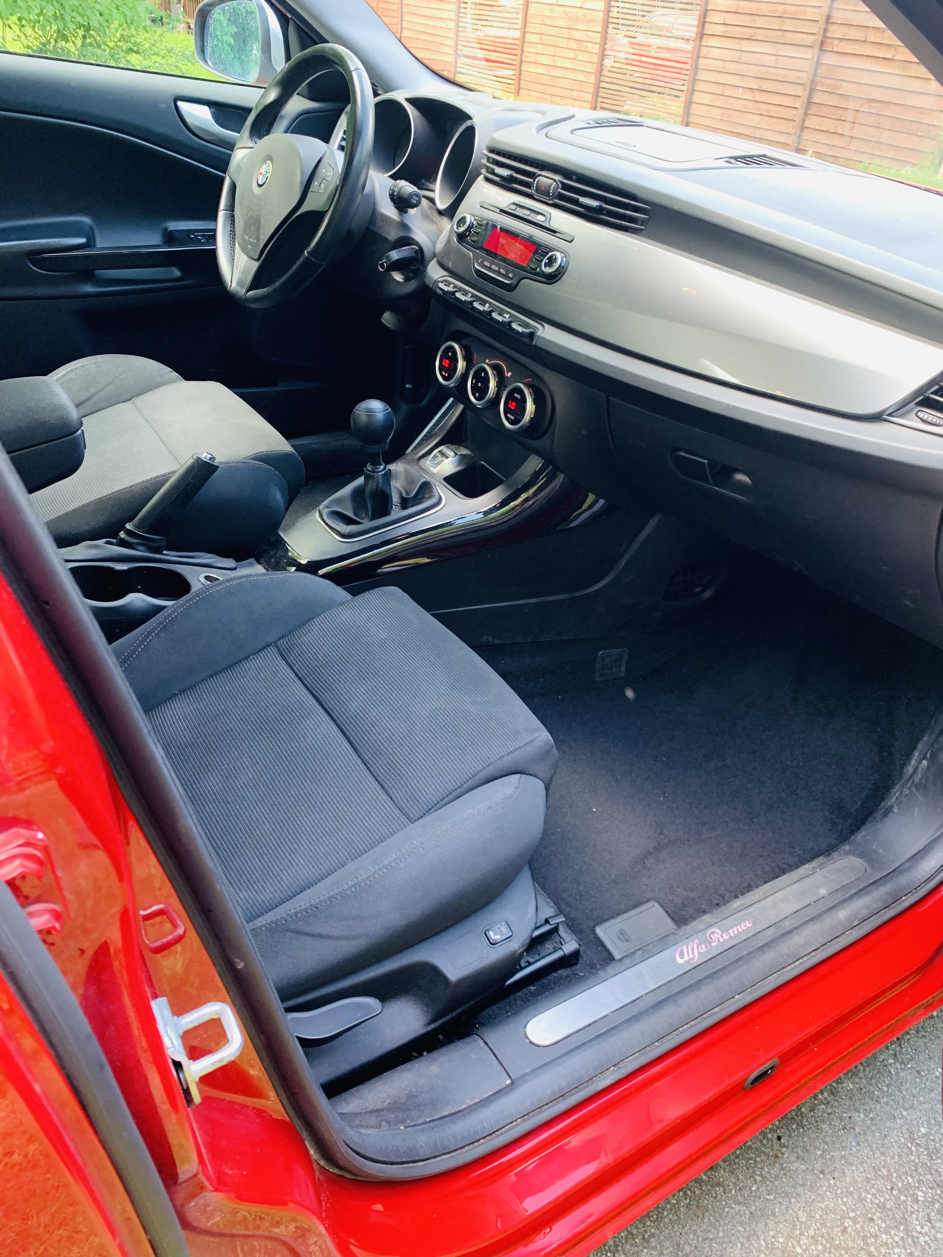 Rød Alfa Romeo Giulietta fra 2011