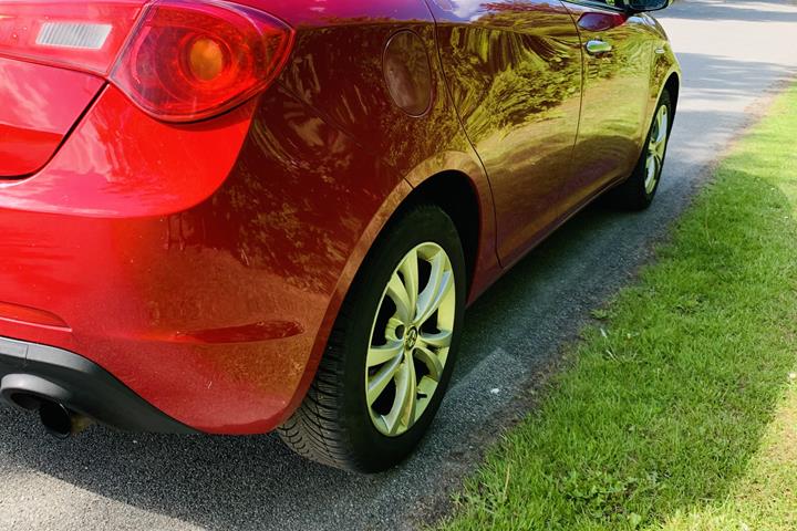 Rød Alfa Romeo Giulietta fra 2011