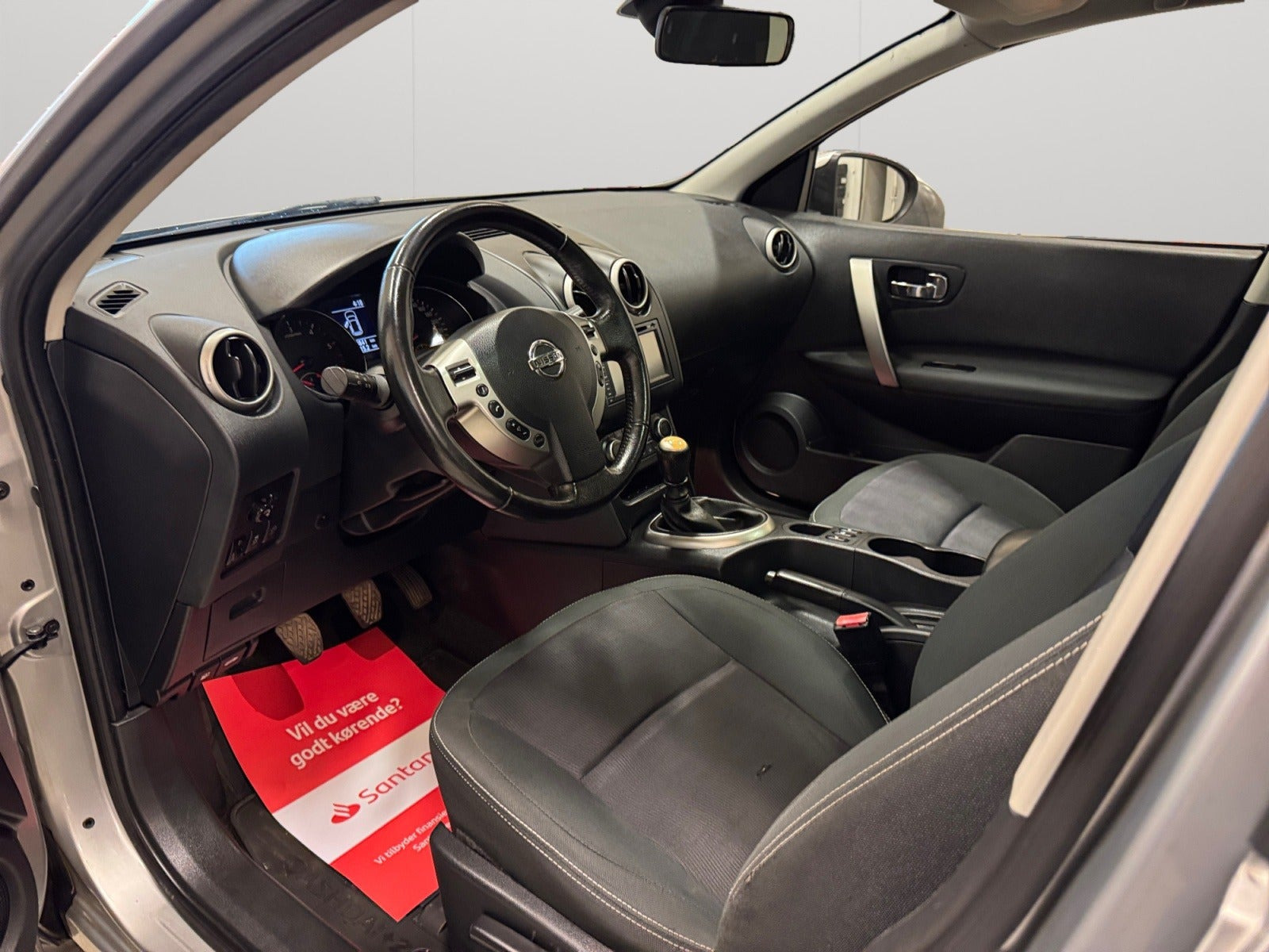 Sølv Nissan Qashqai+2 fra 2012