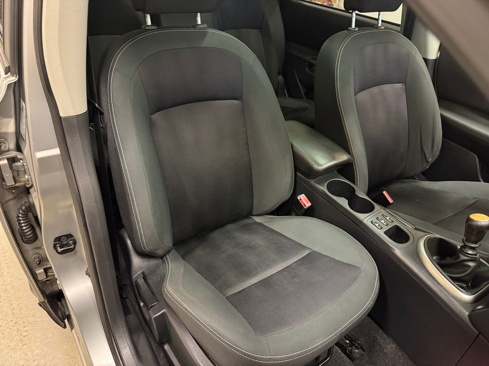 Sølv Nissan Qashqai+2 fra 2012