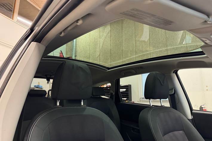 Sølv Nissan Qashqai+2 fra 2012