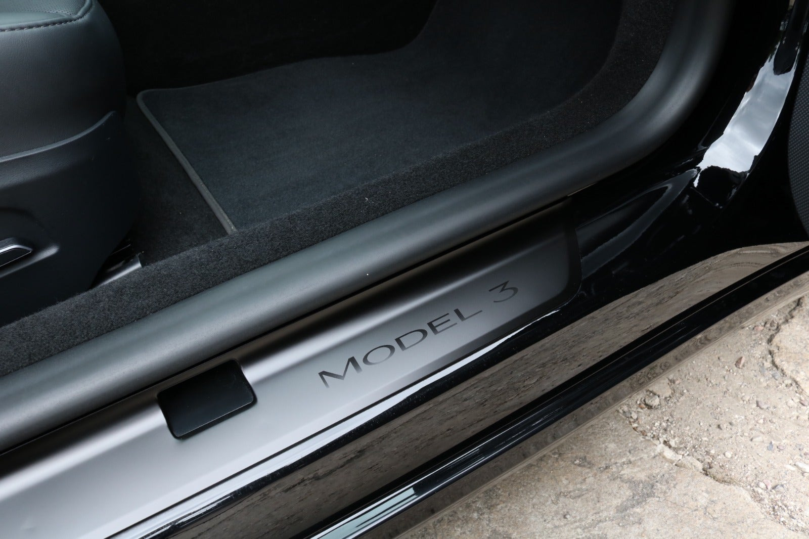 Sort Tesla Model 3 fra 2024