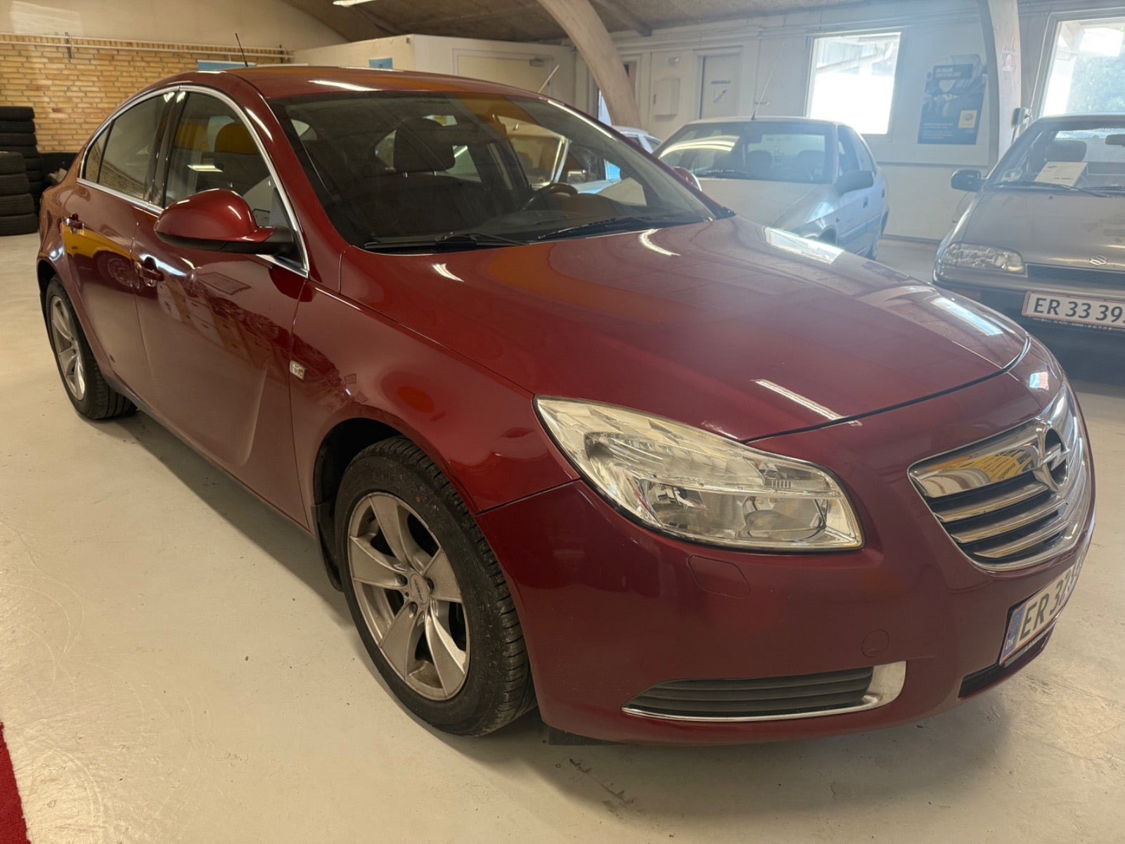 Rød Opel Insignia fra 2009
