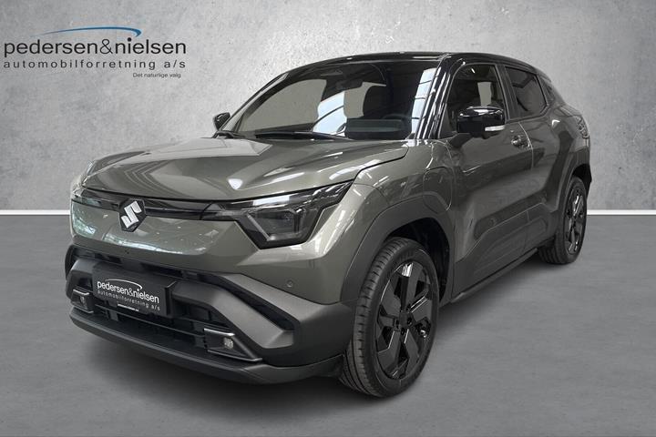 Grøn Suzuki e fra 2025 set udefra