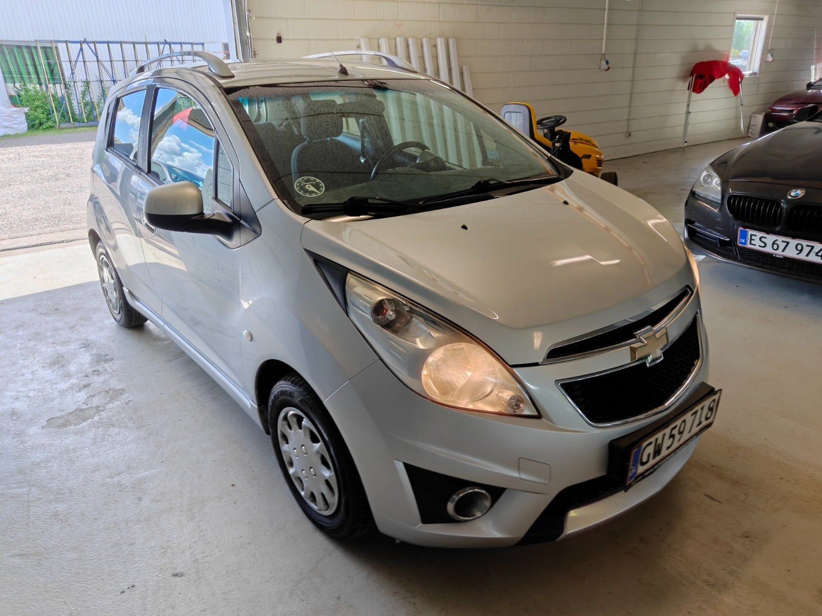Gul Chevrolet Spark fra 2012