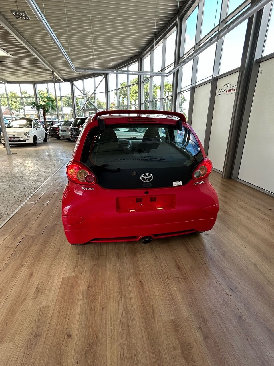 Rød Toyota Aygo fra 2006