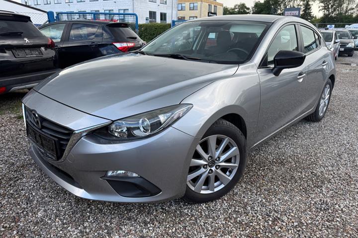 Grå Mazda 3 fra 2013 set udefra