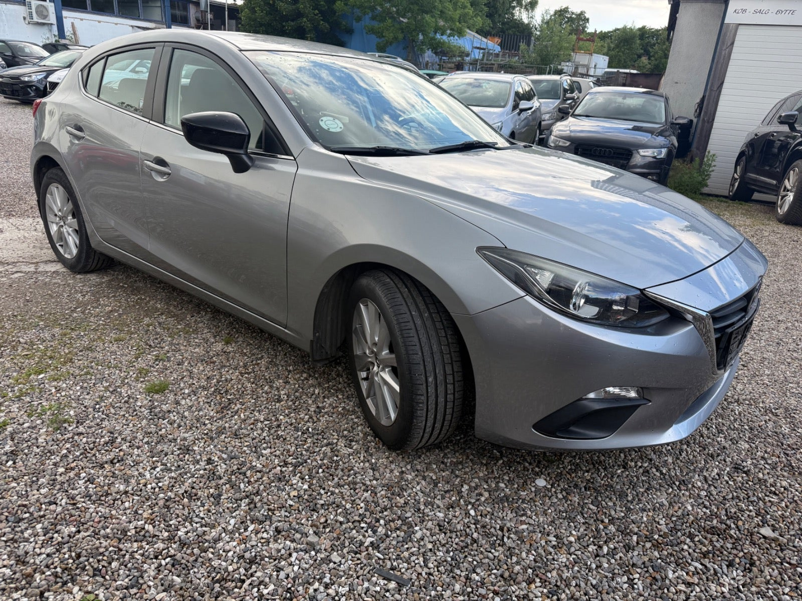 Grå Mazda 3 fra 2013