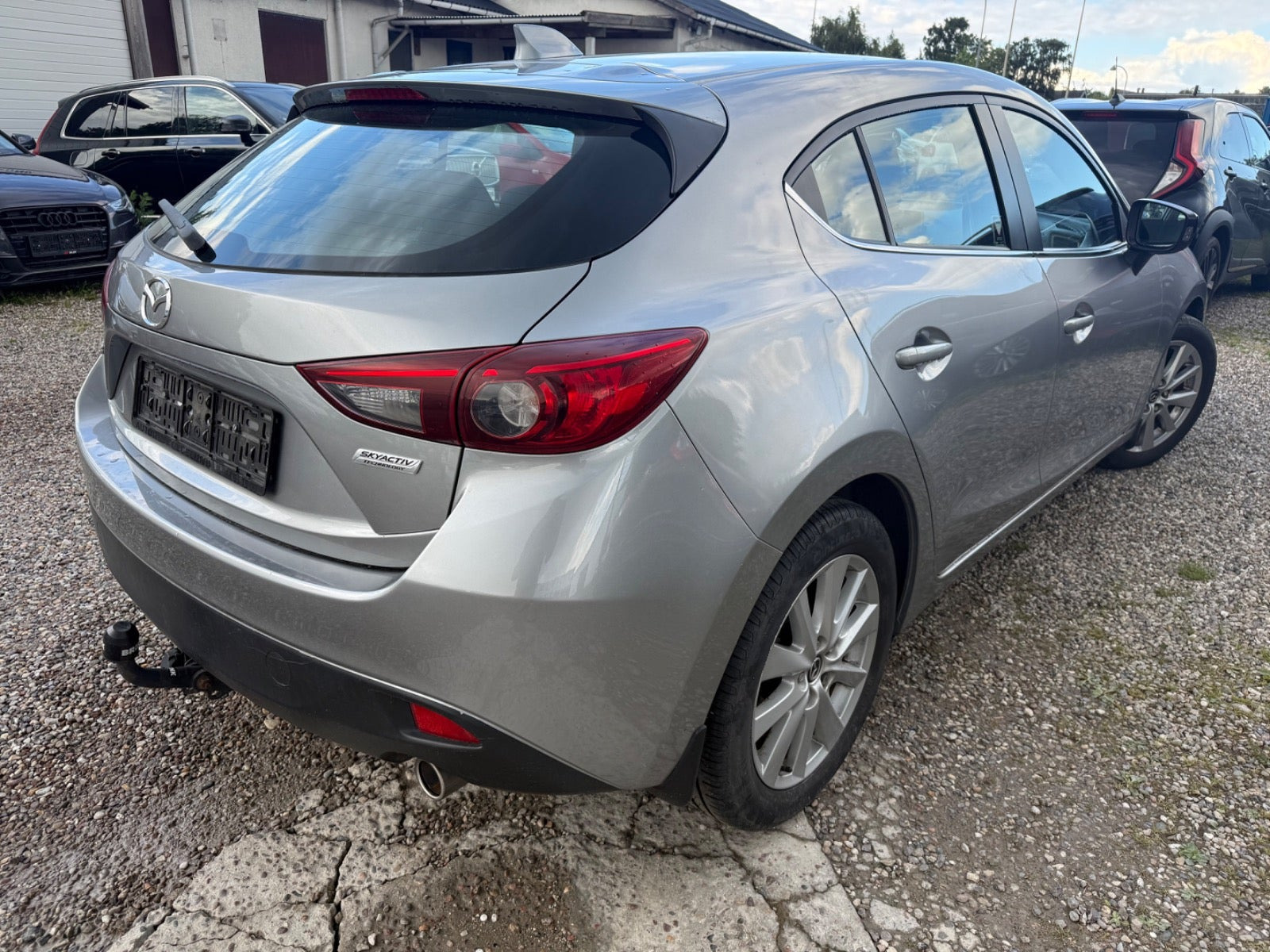 Grå Mazda 3 fra 2013