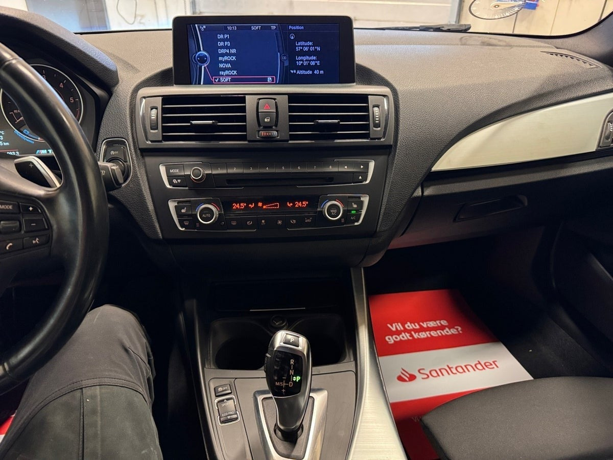 Grå BMW 118d fra 2013