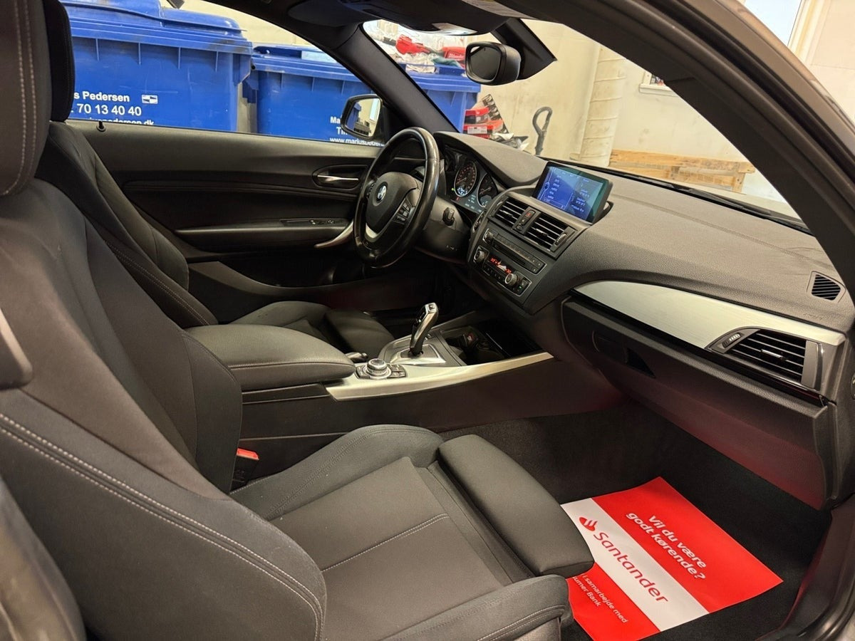 Grå BMW 118d fra 2013
