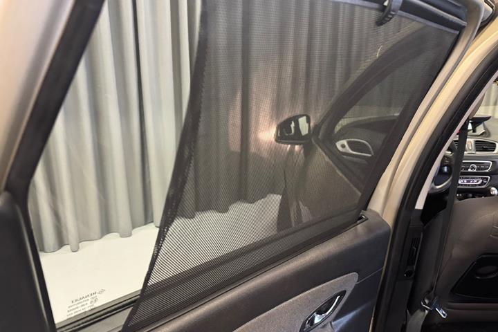 Orange Renault Grand Scenic III fra 2012