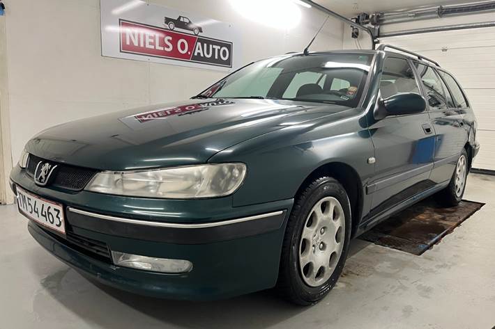 Grøn Peugeot 406 fra 1999