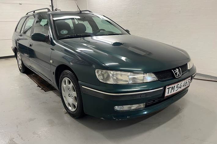 Grøn Peugeot 406 fra 1999